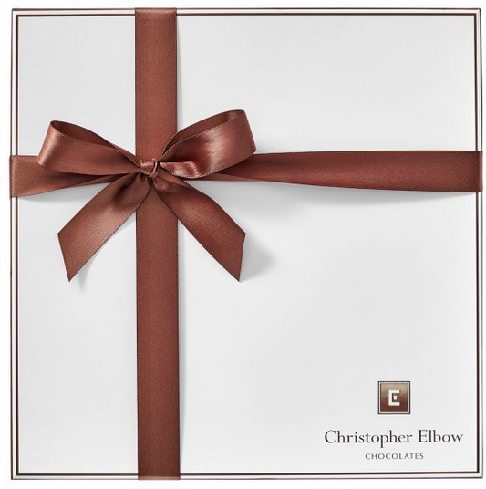 Luxurious box of 36 Christopher Elbow bonbons covered with ribbon